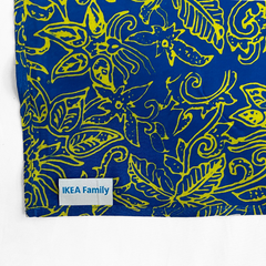 An exclusive, authentic batik creation tailor-made for IKEA, adorned with an 'IKEA Family' tag, set against a neutral backdrop