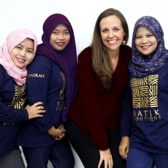 amy blair and seamstresses posing together