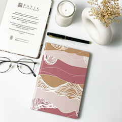 Indulge in creativity with our batik-inspired notebook adorned in the enchanting Dawn Bukit pattern. Against a neutral background, the intricate design brings a touch of sophistication to your everyday note-taking experience