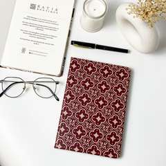 Indulge in creativity with our batik-inspired notebook adorned in Crimson Celestial. Against a neutral background, the intricate design brings a touch of sophistication to your everyday note-taking experience