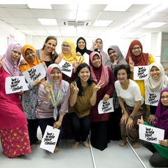a group picture of seamstresses