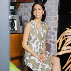 a lifestyle image of a model posing in an authentic batik in the pattern stone chain