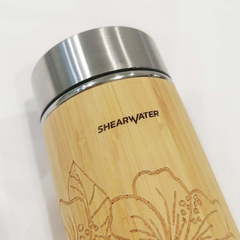 Batik Boutique's previous collaboration with Shearwater featuring custom logo on our wooden tumbler.