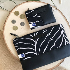a photo of a zip pouch and card holder wallet for a corporate gift