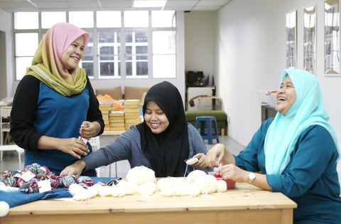 batik boutique seamstresses taking a break