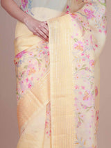 Pastel yellow embroidered organza saree