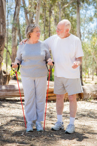 seniors wearing adult diapers on a walk smiling