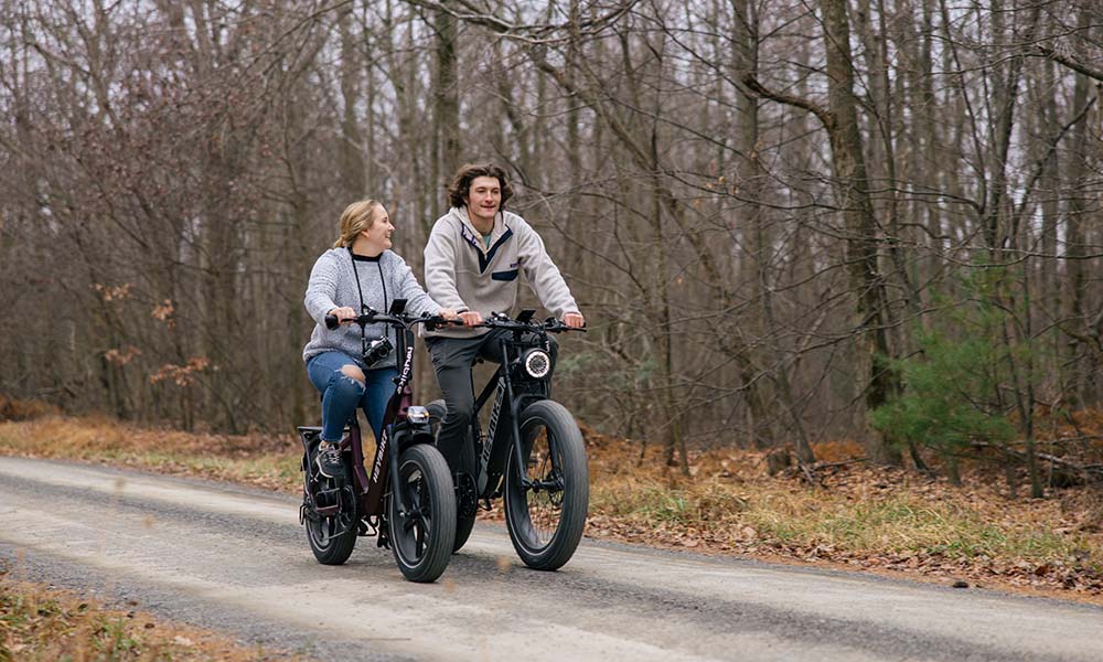 a couple are riding Brawn and Range ebike