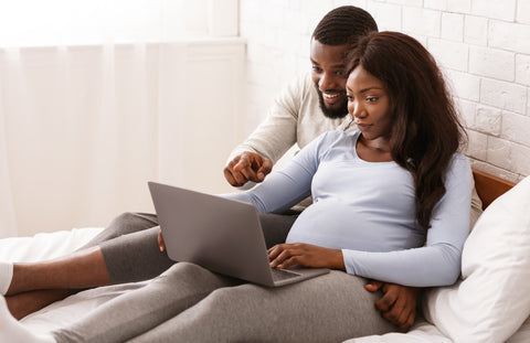 Couple taking Bradley Method birth classes online