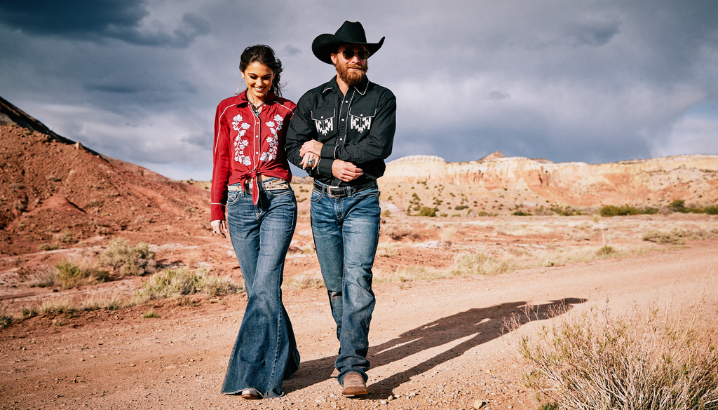 Couple Cowgirl and Cowboy taking a hike in the Old West