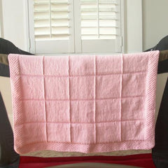 Pink custom blanket - this woman wanted a knitted blanket like one her mom had in the past