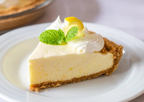a piece of lemon chiffon pie, similar in color to this pastel yellow baby lovey