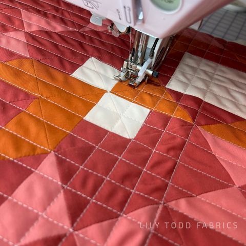quilting the pillow with the sewing machine