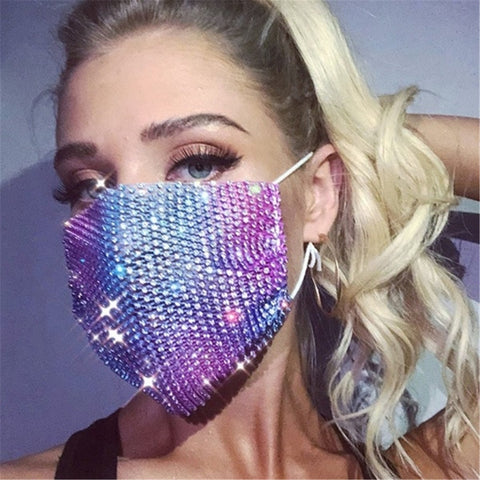 A rave girl wearing sequin rave mask.