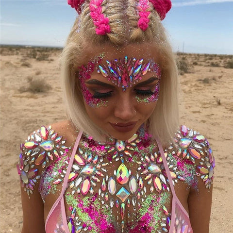A rave girl wearing face jewels at a rave.