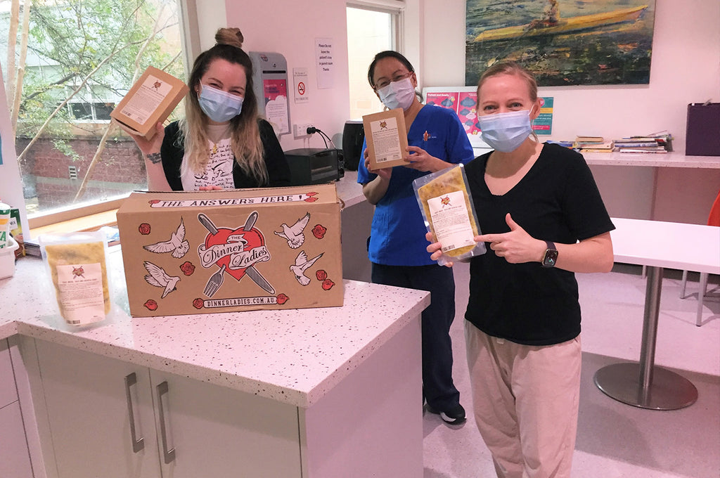 dinner ladies box with nurses wearing masks