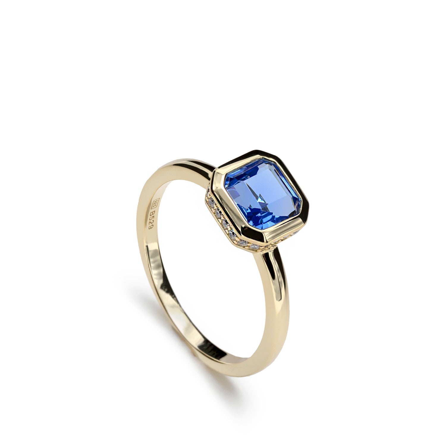 Rings with radiant cut stones sapphire tone and zircons