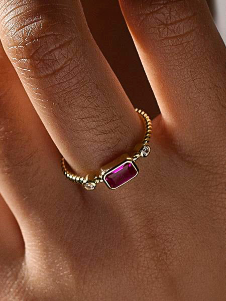 Thin silver rings with fuchsia gemstone and zirconia design