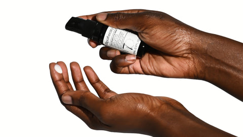 Hyaluronic eye serum with applying on hands