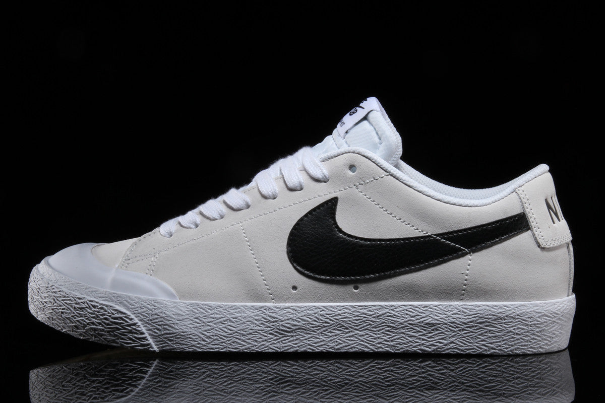 nike blazer low toe cap