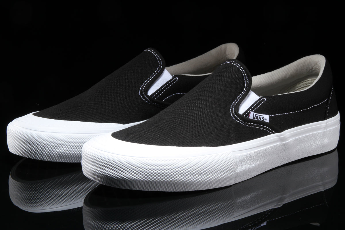 vans slip on pro toe cap black