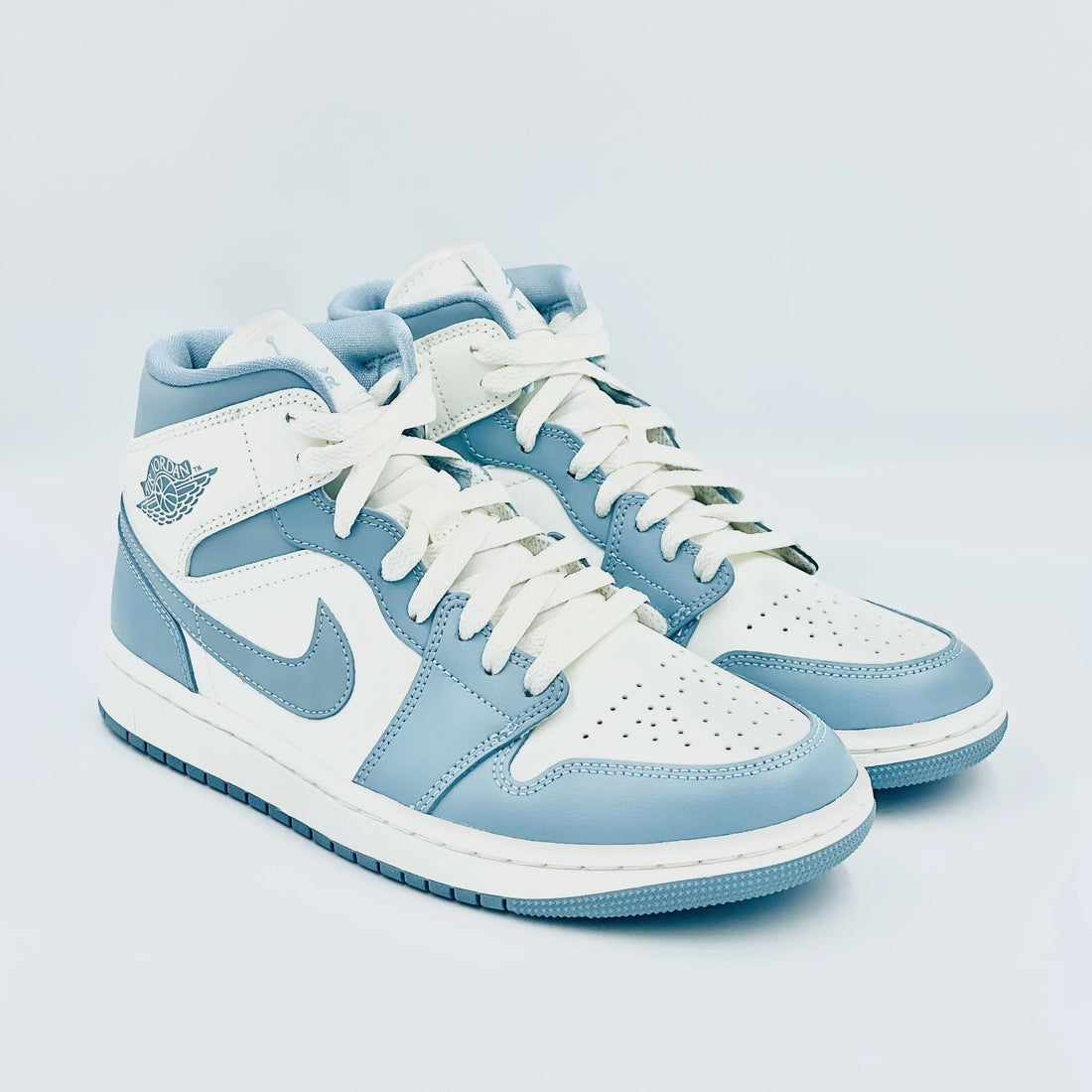 jordan 1 mid university blue womens