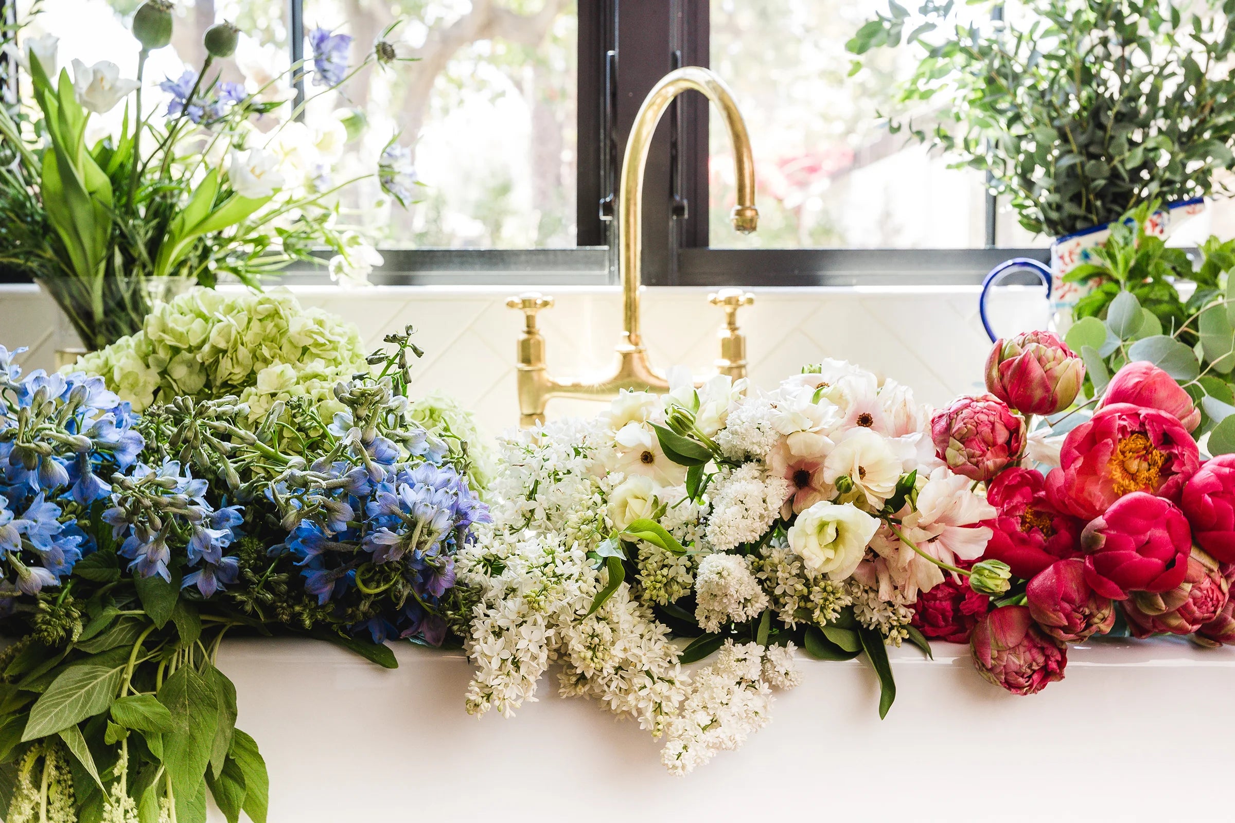 gorgeous fresh cut flowers sitting in a sink