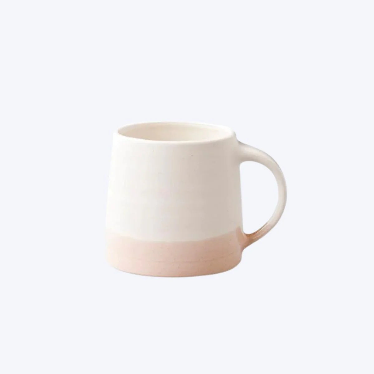 Kinto ceramic mug in beige white color scheme