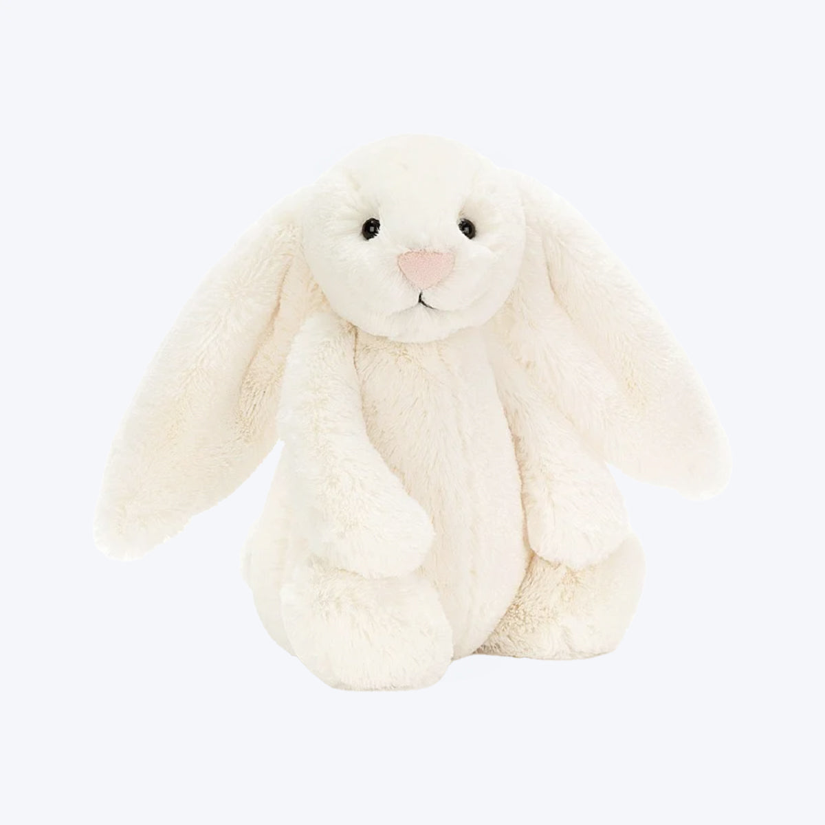 White bunny plushie from Jellycat London.