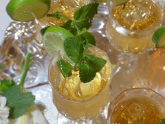 Glass of iced tea garnished with fresh mint