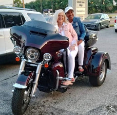 Two ladies on a custom motorcycle