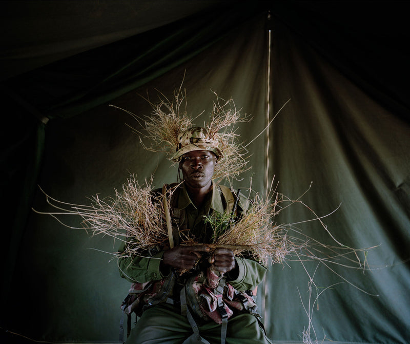 Camouflage warrior  IV Borana Ranch northern Kenya from the series with butterflies and warriors