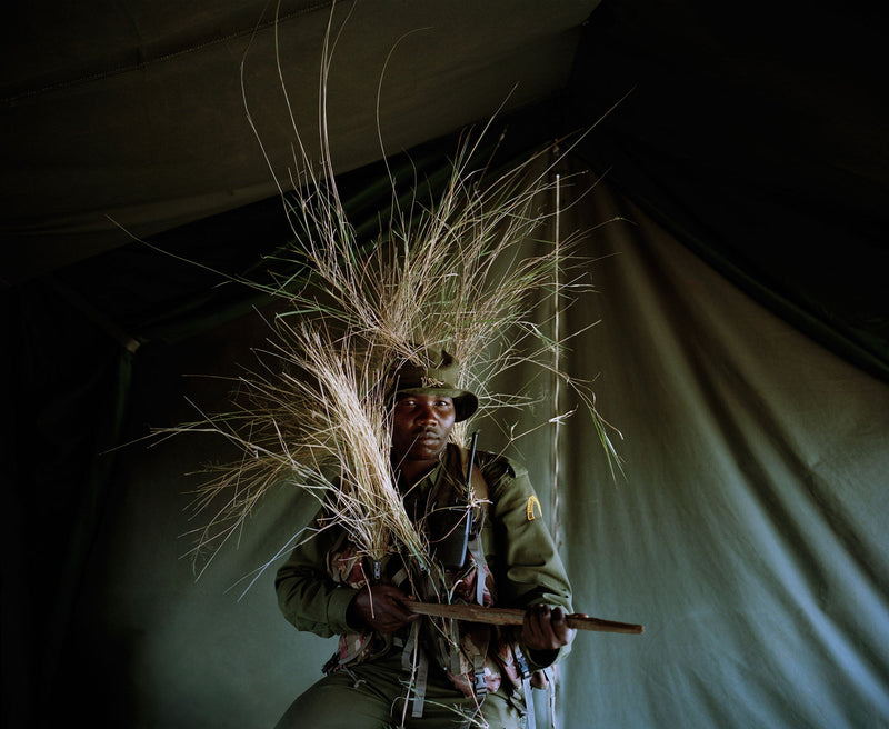 Camouflage warrior  I Borana Ranch northern Kenya from the series with butterflies and warriors