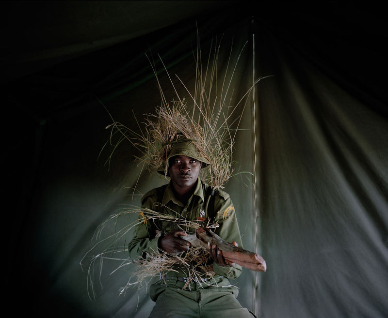 Camouflage warrior  VI Borana Ranch northern Kenya from the series withbutterflies and warriors
