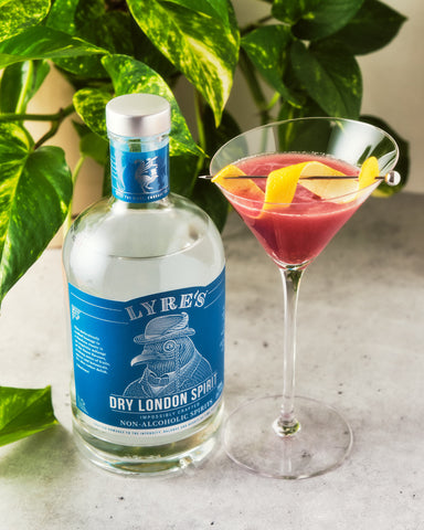 Lyre's Non-Alcoholic Dry London Spirit next to a Raspberry Lemon Gimlet Mocktail