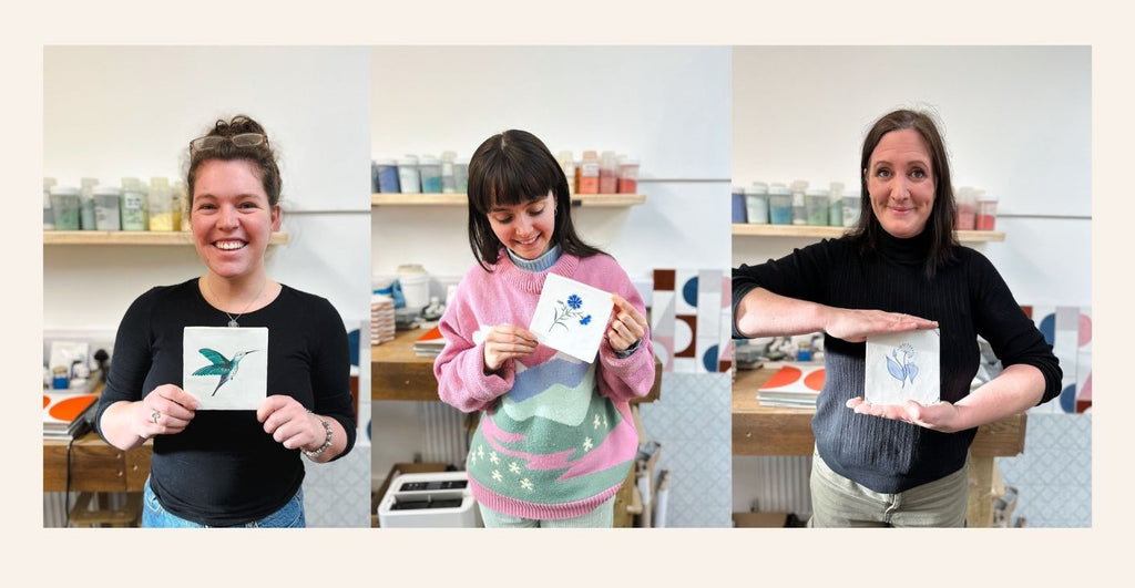 Our artists holding up their favourite tiles of the year