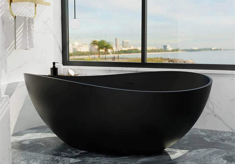 Curved freestanding bathtub in matte black