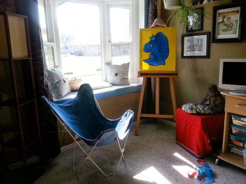 an oil painting of a blue monster work in progress In living room art studio