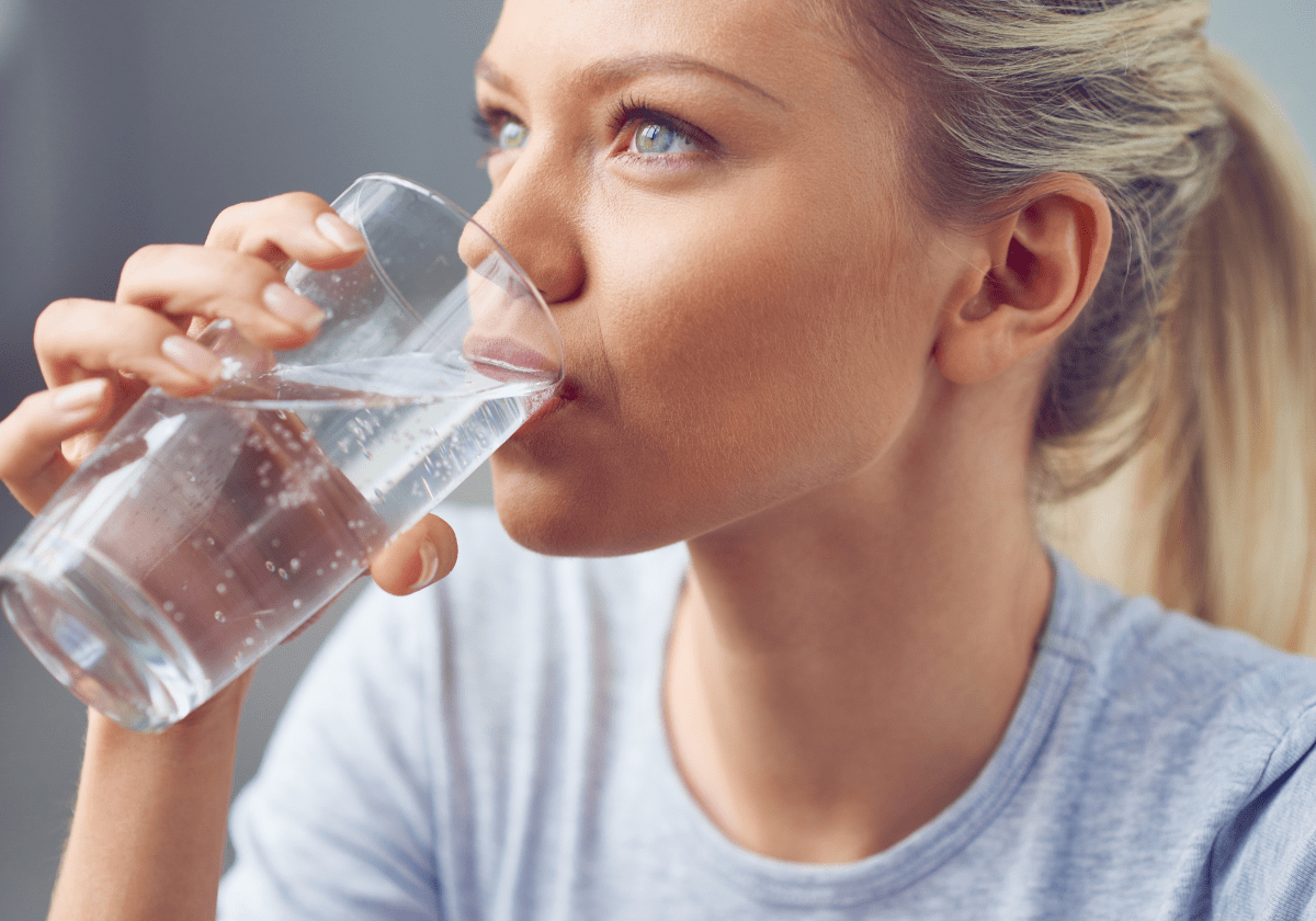 a woman drinking water