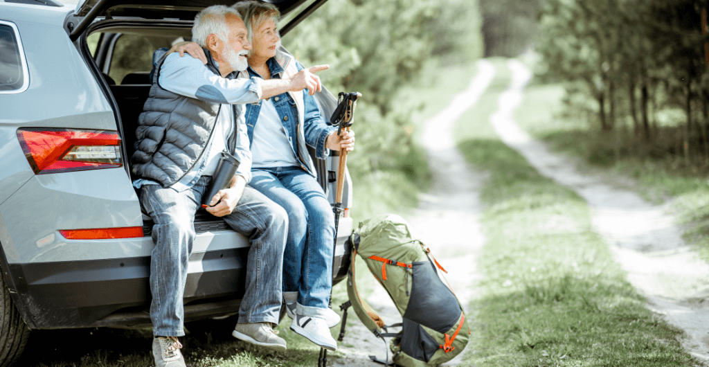 an old couple travelling by car