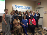 Mary Evangelista with current and former students at a recent Electrolysis Association of North Carolina Meeting