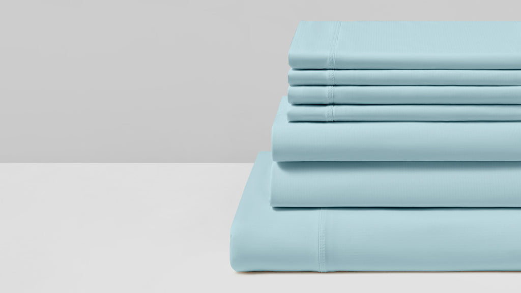 Close-up of the Evercool cooling sheet set bundle in aqua blue