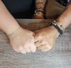 Couple celebrate an anniversary with permanent bracelets
