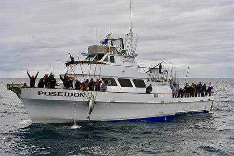 A boat full of happy fisherman