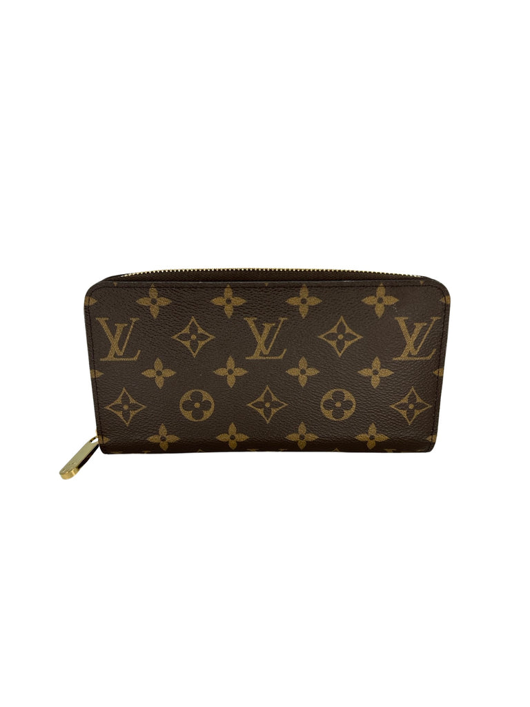 Louis Vuitton Zippy Wallet Blue Monogram in Coated Canvas with