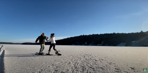 Couple enjoying ice shoeing