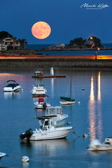 Full moon rising above the Causeway in Marblehead, MA