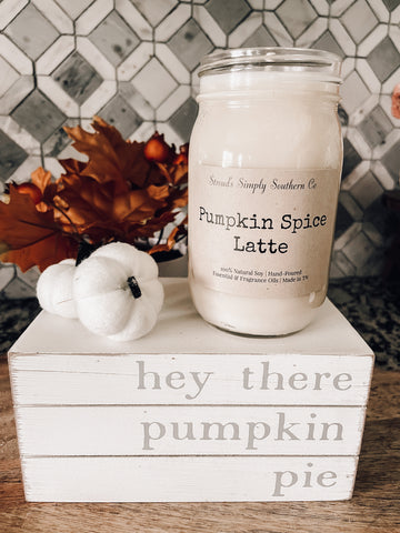 Pumpkin spice latte candle scent in a fall candle jar 
