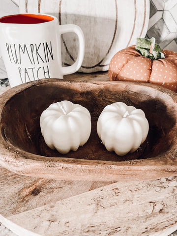 Pumpkin candle molds in a dough bowl 