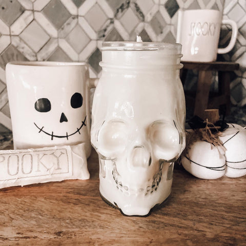 Skull mason jar candle in a fall scent 